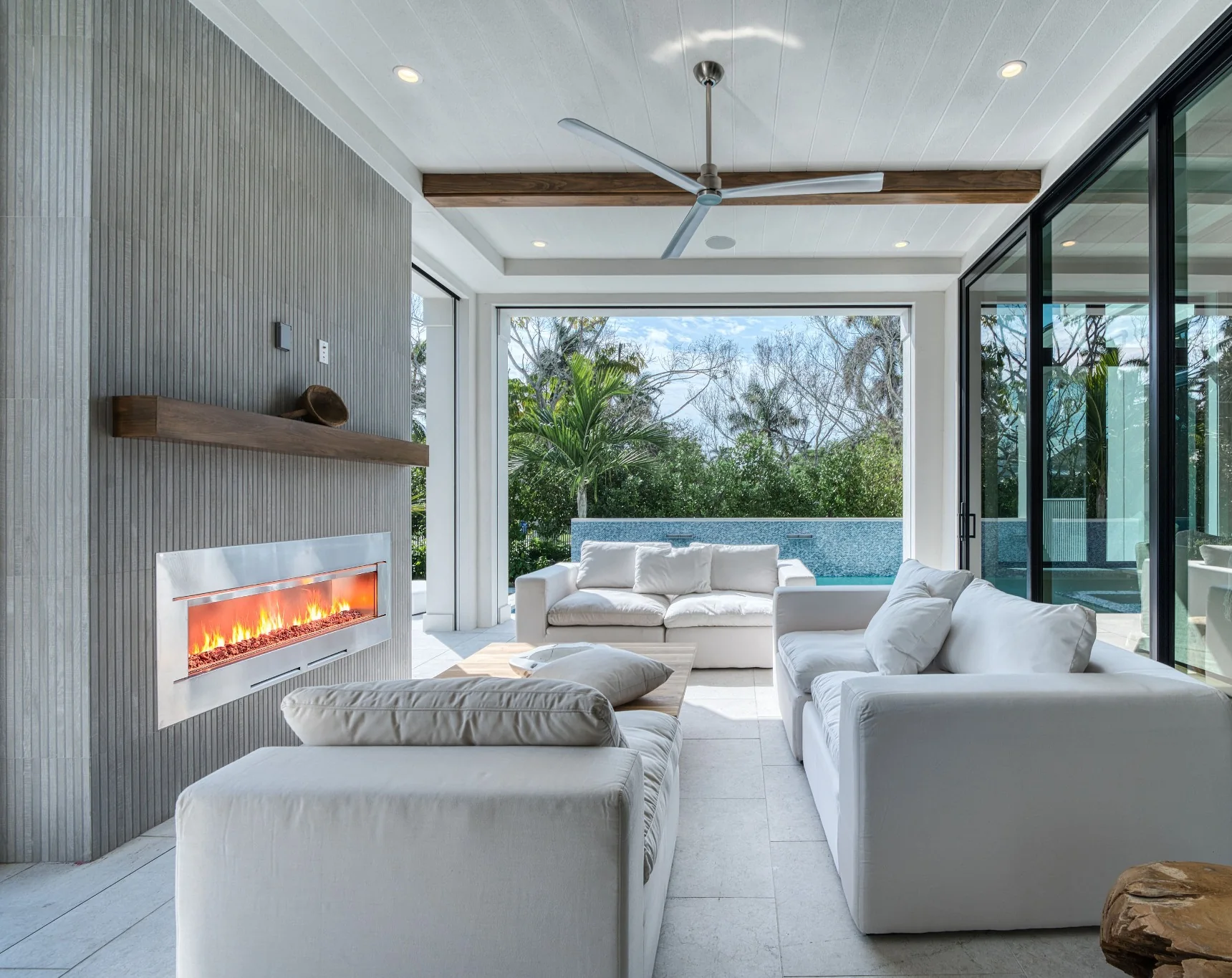 Lake Park Residence covered outdoor living room