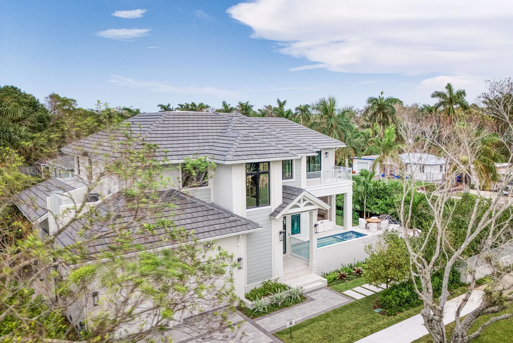 Aerial view of the Lake Park Residence and surrounding neighborhood
